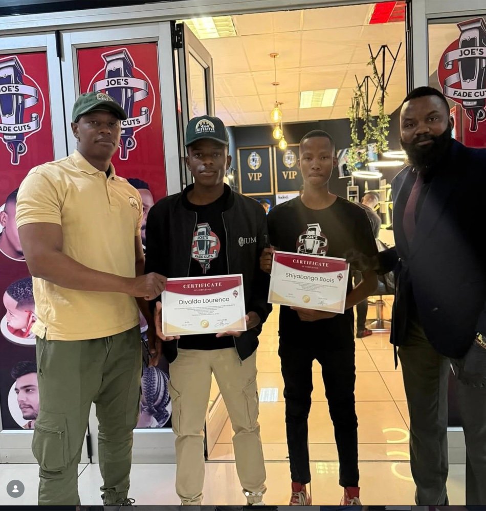Academy graduates receiving certificates